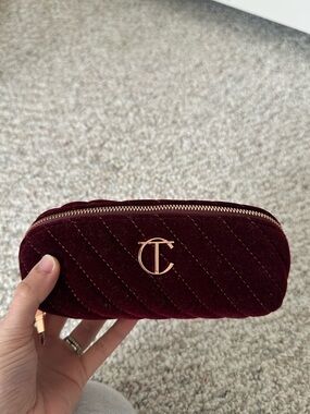 Charlotte Tilbury Quilted Velvet Cosmetic Case in Burgundy with Gold CT Logo